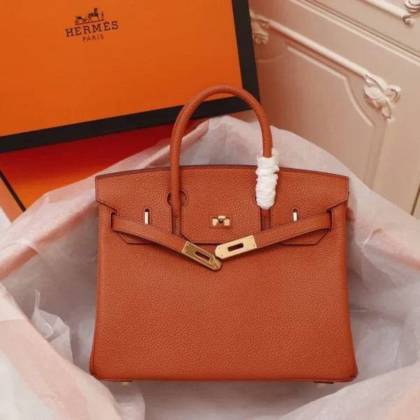 1542985434_100037919_0_f26965e6-1dea-4d52-9dcc-75dec6514245-6e08093cf1c6.webp Hermes Birkin Bag 35 Fire Togo Gold Hardware