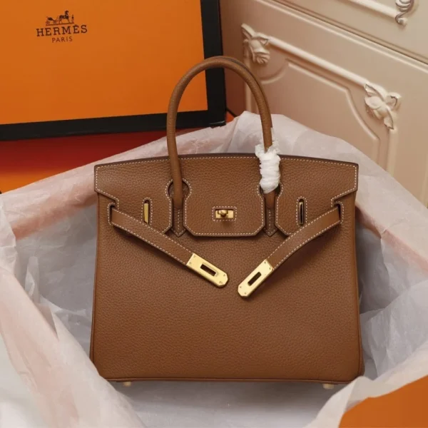 1542985598_2997261025_0_dc6a81bd-f8f0-4859-af8a-e2298d77c2d0-9cb27fa8f482.webp Hermes Birkin Bag 35 Brown Togo Gold Hardware