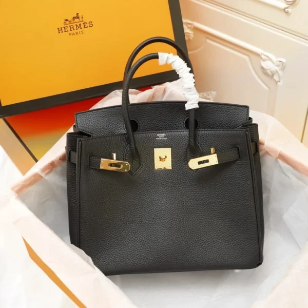 1542985752_2853120042_2_dd9ad0d1-17c6-40e8-8f1b-8848ae3ad363-ae0057a3c7fa.webp Hermes Birkin Bag 35 Black Togo Gold Hardware