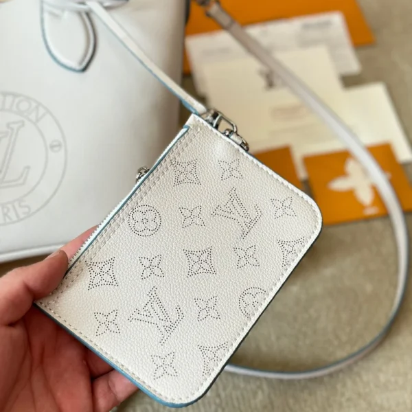 156-1-8ee17adfdf39.webp Louis Vuitton Blossom Mahina Bag With Lv Circle Motif White 23Cm, Designer Handbags, Womens Purse, luxury bags