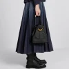1707306474_F_23_4_LOOK_871_E11_GHC-b1eae474e066.webp Medium C’est Dior Bag Black CD-Embossed Calfskin