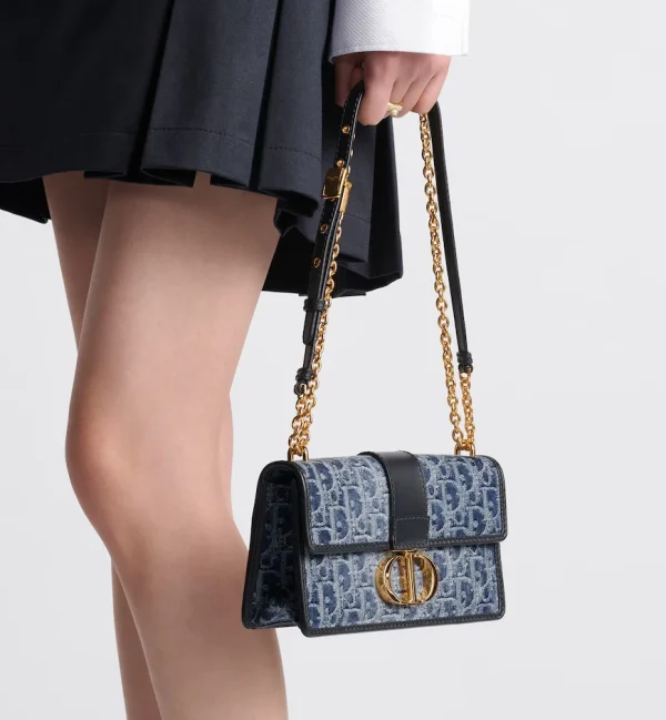1712674130_F_24_3_LOOK_663_E10_GHC-153cdaa559a3.webp 30 Montaigne East-West Bag with Chain