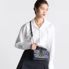 1712674149_F_24_3_LOOK_663_E04_GHC-e5e1d5652bad.webp 30 Montaigne East-West Bag with Chain