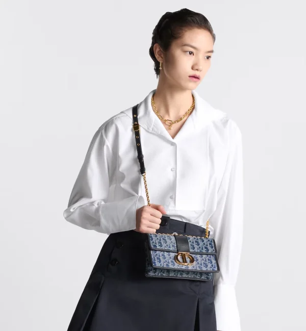 1712674149_F_24_3_LOOK_663_E04_GHC-e5e1d5652bad.webp 30 Montaigne East-West Bag with Chain