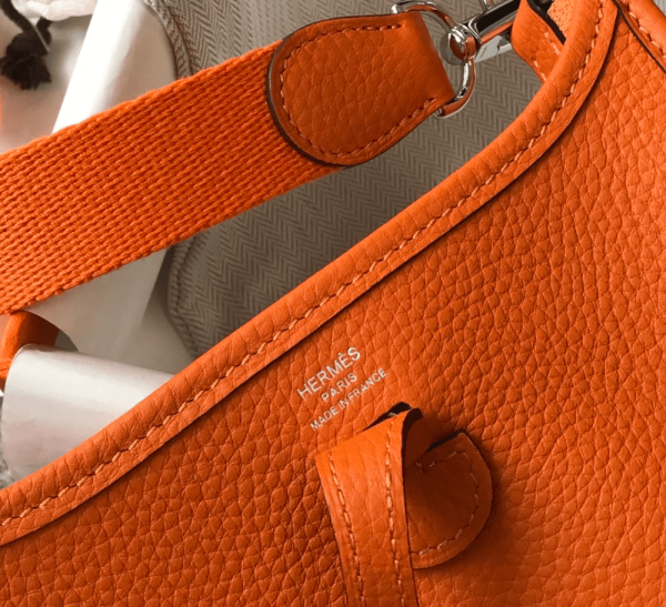 2812f874-2ea22f04d250.webp Hermes Evelyne 16 Amazone Bag Orange With Silver Toned Hardware 18cm