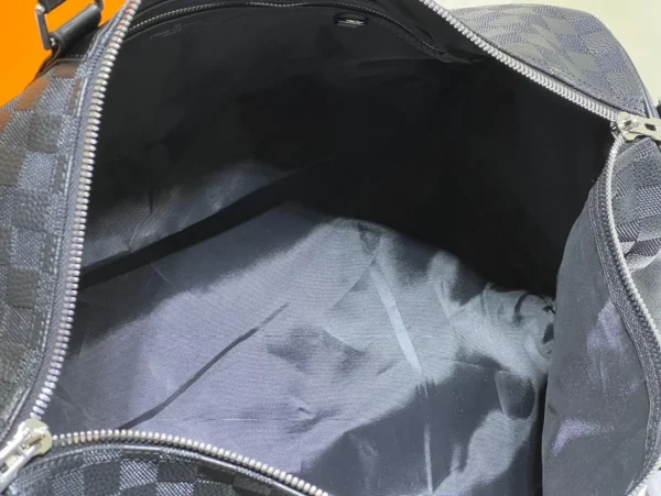 4-14-dbfab96feef7.webp Louis Vuitton Keepall 50 Blue Graphite