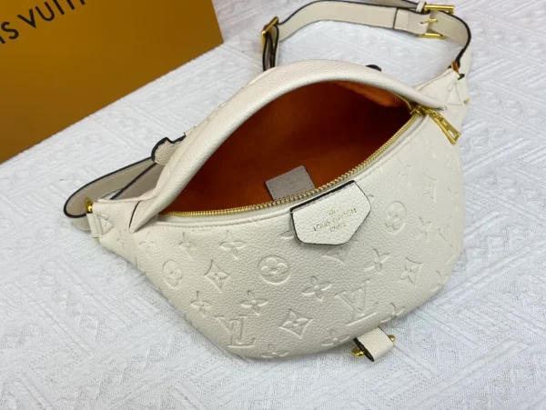 4ynIOPC-1a4a0e0c1c40.webp Louis Vuitton Monogram Empreinte Creme Bumbag 37cm/14.6in M44836, Designer Handbags, Womens Purse, luxury bags