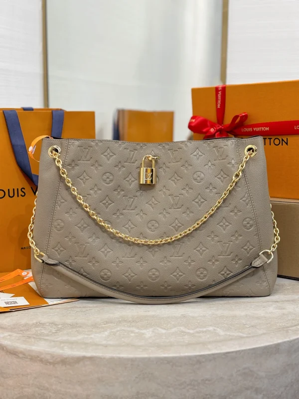 5d94567e-93800cf7da52.webp Louis Vuitton LV Anytime MM Monogram Empreinte Bag Tourterelle Gray M14658 42cm/ 16.5in, Designer Handbags, Womens Purse, luxury bags