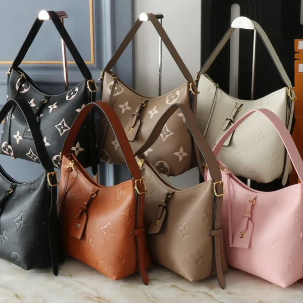 82-2-1-350ea75350d0.webp Louis Vuitton Carryall Pm Monogram Empreinte Pink Opale, Designer Handbags, Womens Purse, luxury bags