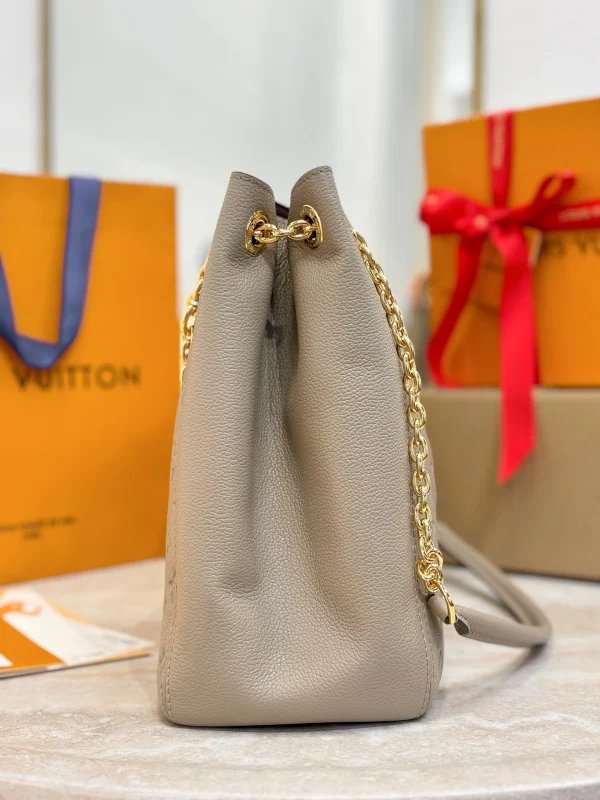9d2a3ec5-fe69579eadf7.webp Louis Vuitton LV Anytime MM Monogram Empreinte Bag Tourterelle Gray M14658 42cm/ 16.5in, Designer Handbags, Womens Purse, luxury bags