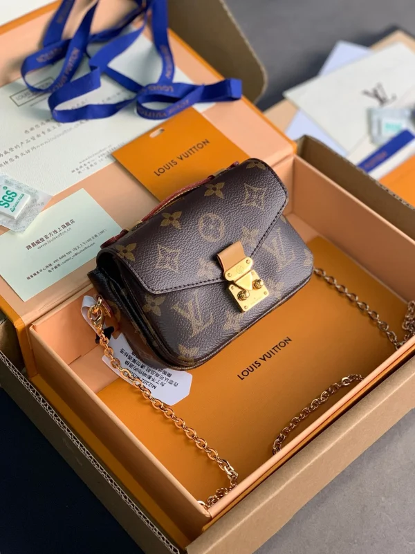 C6021DD3-6848-23D1-6A17-E4AF350FBF54-9505194e6def.webp Louis Vuitton Mini LV Pochette Mtis 21.5cm M46279, Designer Handbags, Womens Purse, luxury bags