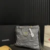 CNCB1-1ac5fa1fe914.webp Chanel Large Backpack Printed Fabric And Gold Metal In Black And White 36Cm, Designer Handbags, Women’s Purse, luxury bags, Chanel bags