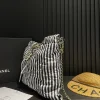 CNCB3-bedebb3b414a.webp Chanel Large Backpack Printed Fabric And Gold Metal In Black And White 36Cm, Designer Handbags, Women’s Purse, luxury bags, Chanel bags