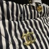 CNCB5-fddc0e80a588.webp Chanel Large Backpack Printed Fabric And Gold Metal In Black And White 36Cm, Designer Handbags, Women’s Purse, luxury bags, Chanel bags