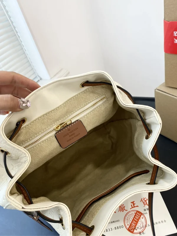 GCS7-2-1-a0576c02ee17.webp Louis Vuitton Montsouris Backpack Empreinte White And Brown 25Cm, Designer Handbags, Womens Purse, luxury bags