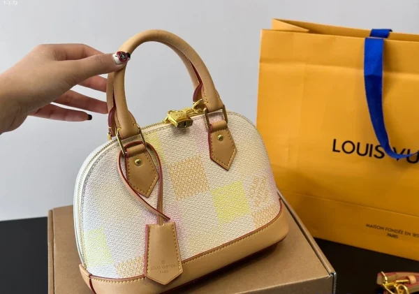 LV3-1-2-e9230f06b952.webp Louis Vuitton Alma Bb Damier Canvas Peach 23Cm N40516, Designer Handbags, Womens Purse, luxury bags