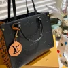 LVB28-1-c76a9cf8a1cf.webp Louis Vuitton Wild At Heart OnTheGo MM M58522 Black 35Cm, Designer Handbags, Womens Purse, luxury bags