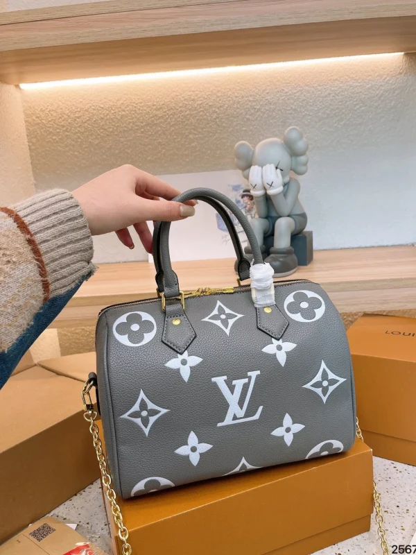 LVBP1-6-0101fddc9c77.webp Louis Vuitton Speedy Bandouli Re 20 Monogram Empreinte Leather 20Cm M46575, Designer Handbags, Womens Purse, luxury bags