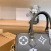 LVBP4-6-3552afbac551.webp Louis Vuitton Speedy Bandouli Re 20 Monogram Empreinte Leather 20Cm M46575, Designer Handbags, Womens Purse, luxury bags