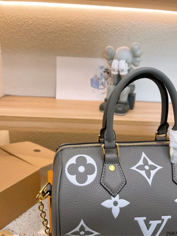 LVBP4-6-3552afbac551.webp Louis Vuitton Speedy Bandouli Re 20 Monogram Empreinte Leather 20Cm M46575, Designer Handbags, Womens Purse, luxury bags