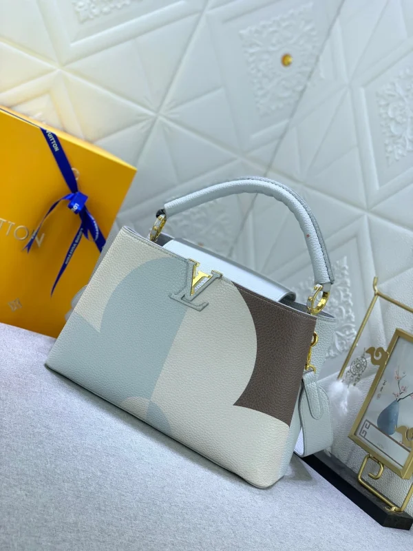 LVCIA09-f3669b436cea.webp Louis Vuitton Capucines Ice Age White 31.5Cm, Designer Handbags, Womens Purse, luxury bags
