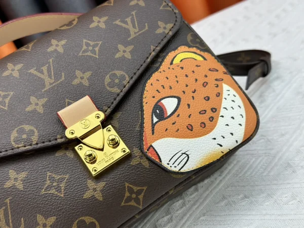 LVPB4-001fe7839c5c.webp Louis Vuitton Pochette M Tis Monogram Coated Canvas 25Cm M47203, Designer Handbags, Womens Purse, luxury bags