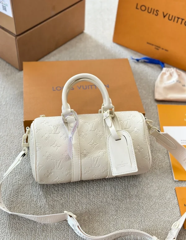 LVW1-a41f4d5e2a4e.webp Louis Vuitton Keepall Bandouli Re Full Moon 25Cm M24434, Designer Handbags, Womens Purse, luxury bags