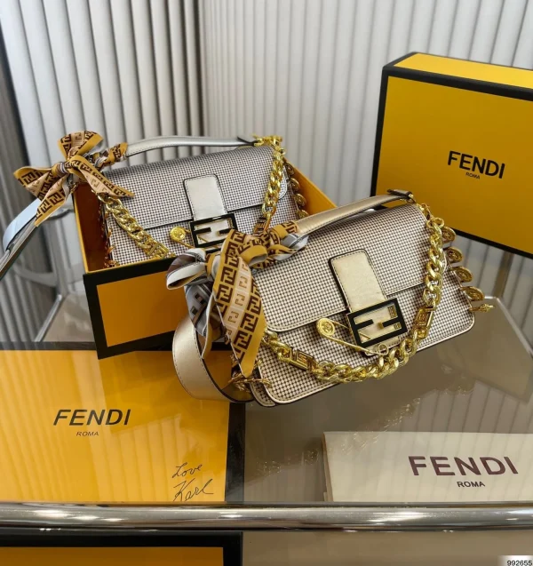 PRABG2-d6ea364d89d7.webp Fendi X Versace Baguette Fendace Bag In Gold Perforated Leather 25Cm