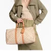 SUPERCLONE-2026-08-11T151352.138.webp Louis Vuitton Keepall Bandoulière Bag 45cm/17.7in Monogram Dune / Beige M28238
