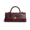 SUPERCLONE-2026-08-14T162000.119-64d095778d88.webp Chanel Maxi Flap Bag With Top Handle 31cm/12.2in Red AS6091