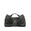 Thap-cam-6-cc7eabb2ace9.webp Chanel Grey Bow Pattern Chain Shoulder Bag