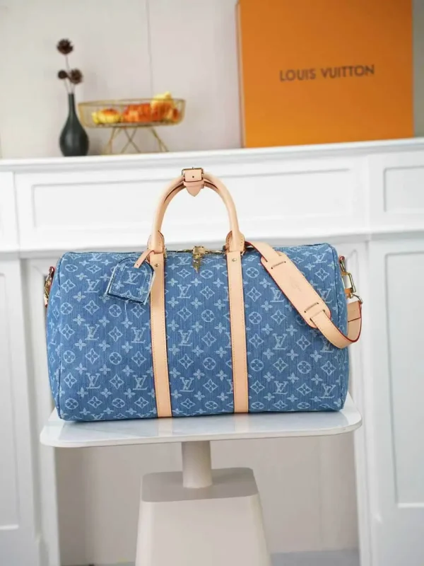 WhatsApp-Image-2026-07-01-at-11.21.09.webp Louis Vuitton Keepall 45 Bag Blue Denim Fabric M27943