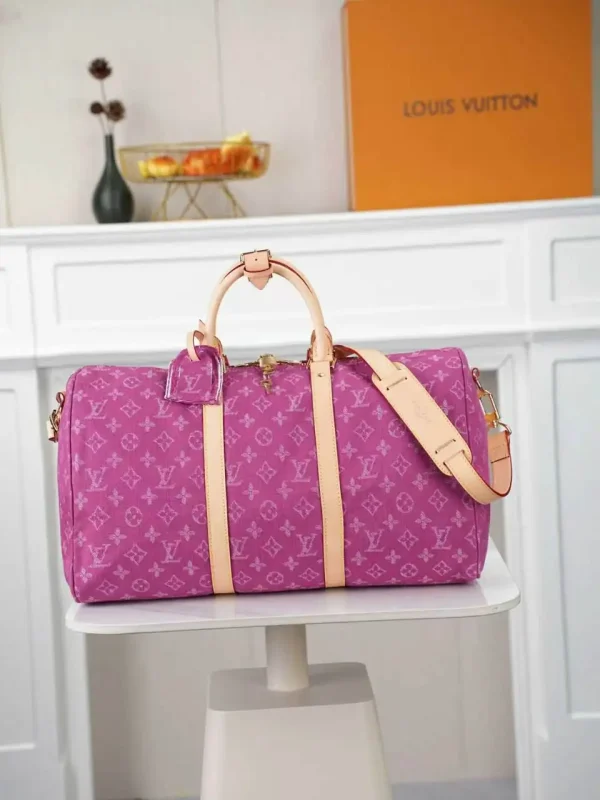 WhatsApp-Image-2026-07-01-at-11.21.19.webp Louis Vuitton Keepall 45 Bag Fuchsia Denim M27944