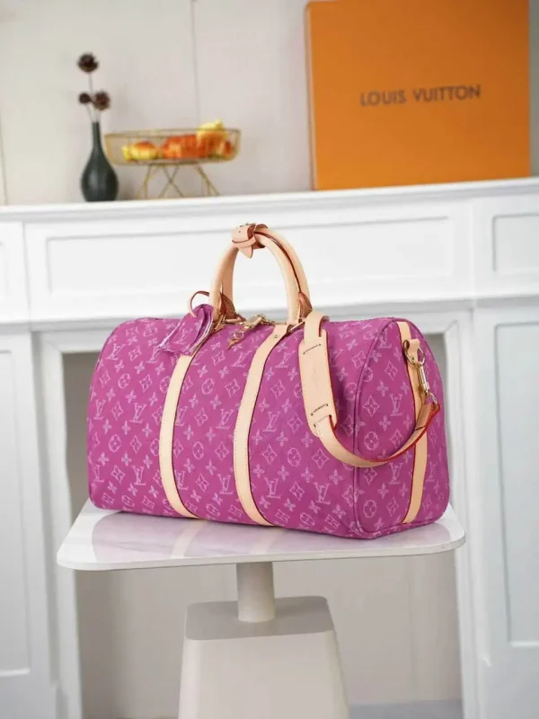 WhatsApp-Image-2026-07-01-at-11.21.20.webp Louis Vuitton Keepall 45 Bag Fuchsia Denim M27944