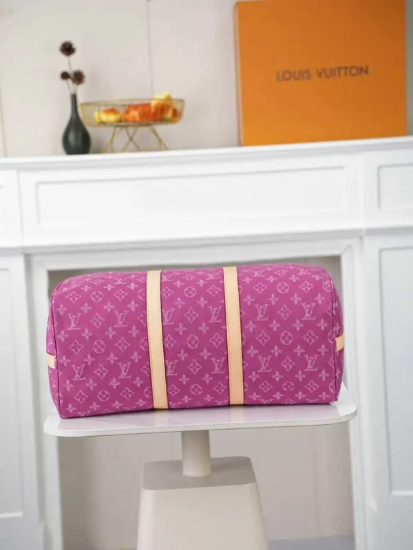 WhatsApp-Image-2026-07-01-at-11.21.21.webp Louis Vuitton Keepall 45 Bag Fuchsia Denim M27944