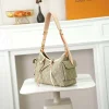 WhatsApp-Image-2026-07-01-at-13.53.13.webp Louis Vuitton Carryall Cargo PM Bag Khaki Denim 33.5cm M27623