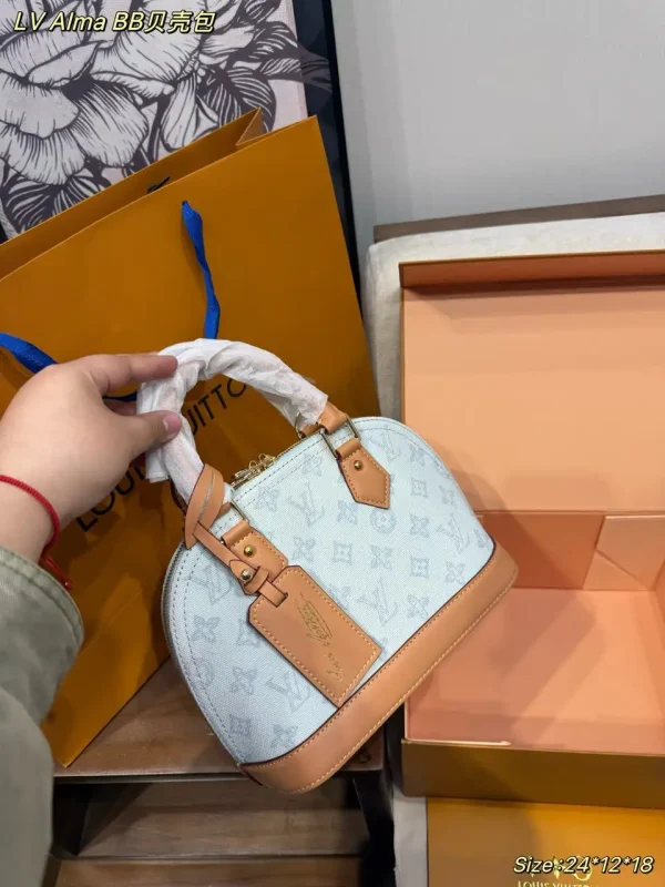 Louis Vuitton Alma BB Bag Monogram Origine Bleu Courrier 23.5cm M27526