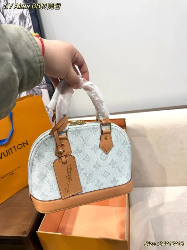 Louis Vuitton Alma BB Bag Monogram Origine Bleu Courrier 23.5cm M27526