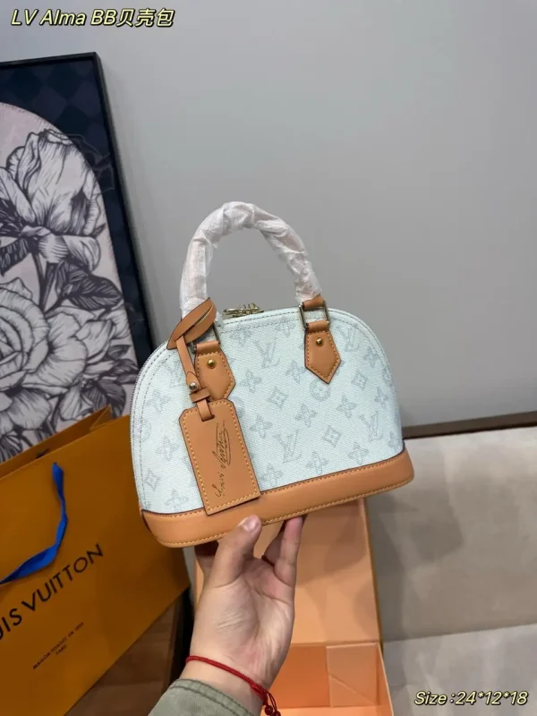 Louis Vuitton Alma BB Bag Monogram Origine Bleu Courrier 23.5cm M27526
