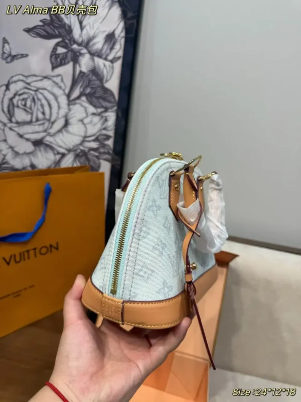 Louis Vuitton Alma BB Bag Monogram Origine Bleu Courrier 23.5cm M27526
