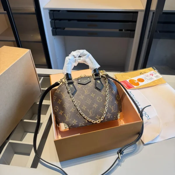 WhatsApp-Image-2026-07-03-at-11.48.12-1.webp Louis Vuitton Alma Trunk BB Bag Monogram Canvas 22cm M26084