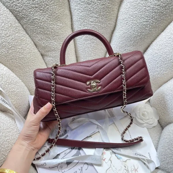 WhatsApp-Image-2026-07-16-at-10.51.09-1-1-1022f49d85a8.webp Chanel Maxi Flap Bag With Top Handle 31cm/12.2in Red AS6091