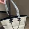 WhatsApp-Image-2026-07-16-at-10.53.10-1-1-bb77c0c9c9ee.webp Chanel Small Tote Canvas, Calfskin & Gold-Tone Metal 45cm/17.7in Ecru & Black AS6285