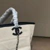 WhatsApp-Image-2026-07-16-at-10.53.10-3-a74c12ebd754.webp Chanel Small Tote Canvas, Calfskin & Gold-Tone Metal 45cm/17.7in Ecru & Black AS6285