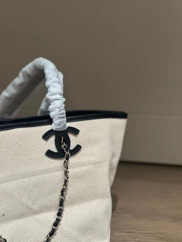 WhatsApp-Image-2026-07-16-at-10.53.10-3-a74c12ebd754.webp Chanel Small Tote Canvas, Calfskin & Gold-Tone Metal 45cm/17.7in Ecru & Black AS6285