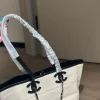 WhatsApp-Image-2026-07-16-at-10.53.11-1-1-41353745fbd3.webp Chanel Small Tote Canvas, Calfskin & Gold-Tone Metal 45cm/17.7in Ecru & Black AS6285