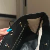 WhatsApp-Image-2026-07-16-at-10.53.12-1-1-2d9049d3279a.webp Chanel Small Tote Canvas, Calfskin & Gold-Tone Metal 45cm/17.7in Ecru & Black AS6285