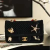 WhatsApp-Image-2026-07-16-at-10.59.37-2-1-c9b5310bfeed.webp Chanel Small Flap Bag Mesh, Charms & Gold-Tone Metal 21cm/8.3in Black AS6156