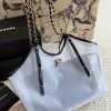 WhatsApp-Image-2026-07-16-at-11.00.24-2-1-c4fc3ef6c5ba.webp Chanel Small Tote Mesh, Calfskin & Gold-Tone Metal Transparent & Black 28cm/11in AS6015