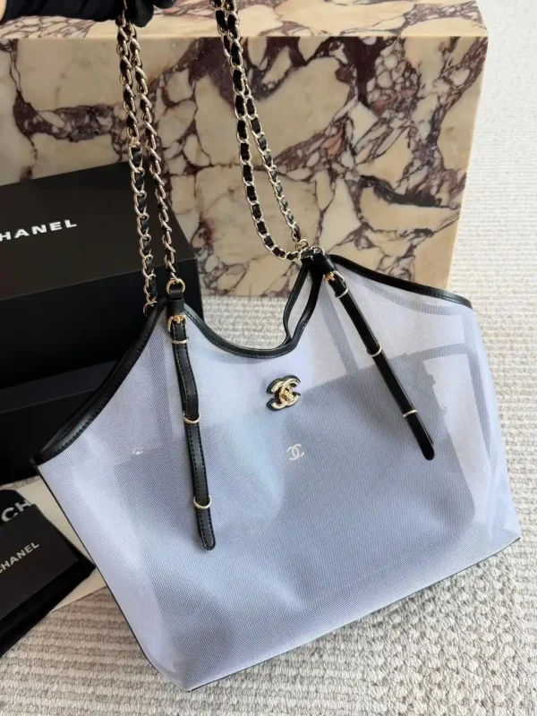 WhatsApp-Image-2026-07-16-at-11.00.24-2-1-c4fc3ef6c5ba.webp Chanel Small Tote Mesh, Calfskin & Gold-Tone Metal Transparent & Black 28cm/11in AS6015